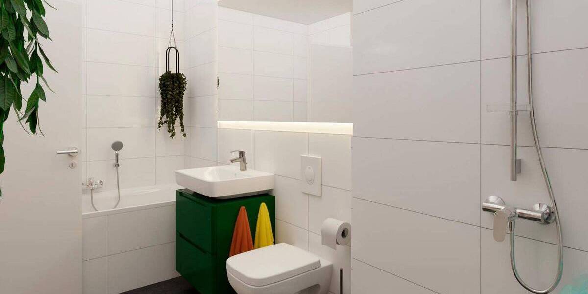 Das Badezimmer enthält eine bodengleiche Dusche